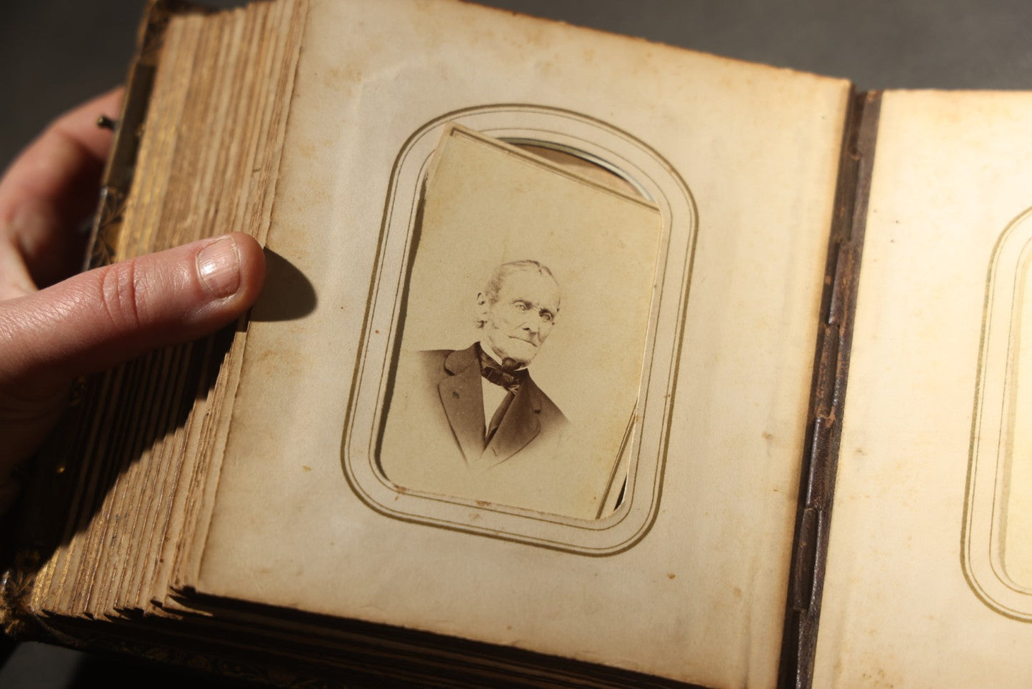 Antique Portrait Photo Album Containing 32 Tintype Photographs and 11 Carte de Visite C.D.V. Photographs, Leather Binding with Gauffered Edges, manufactured by Altemus & Co., Philadelphia, circa 1860s