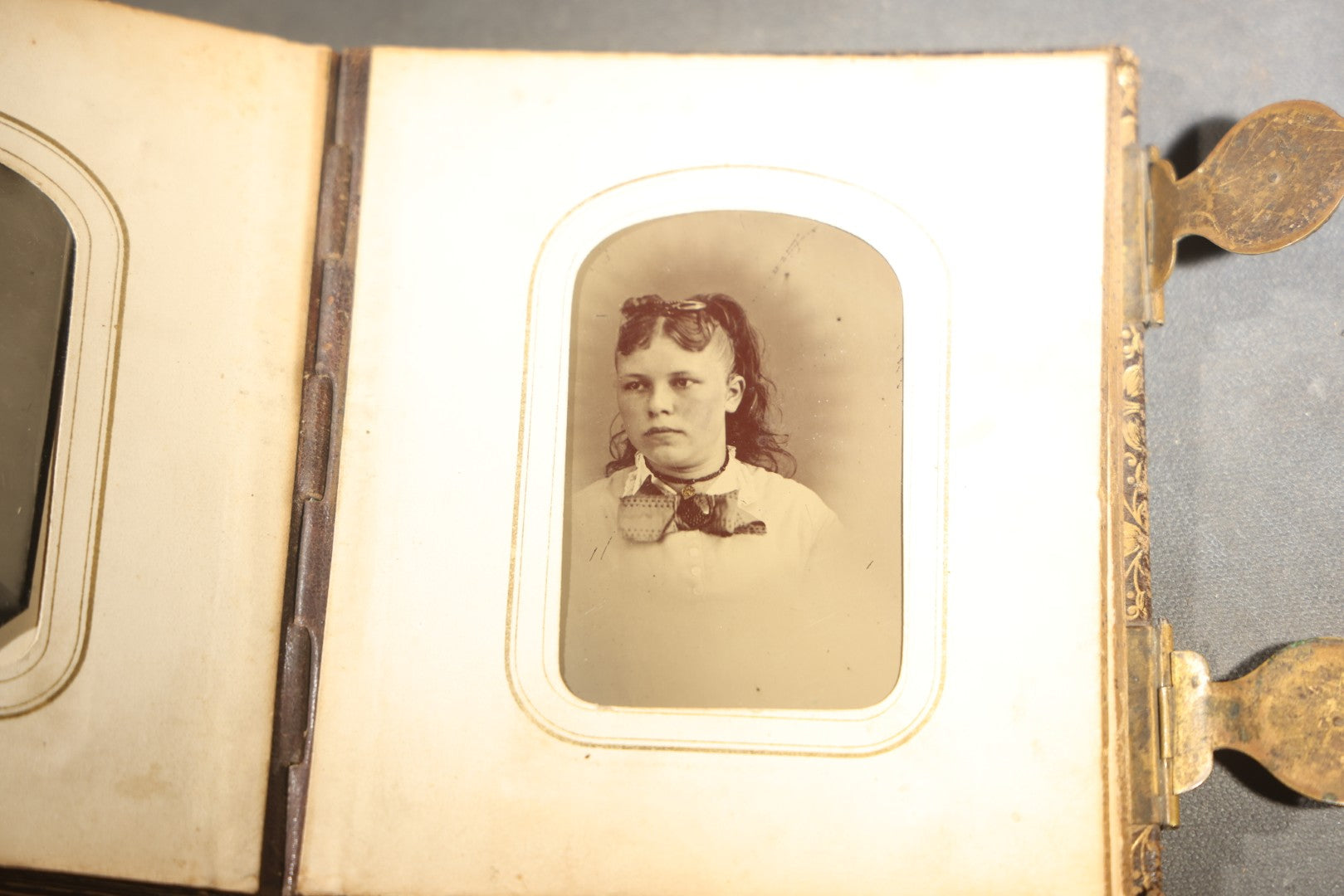 Antique Portrait Photo Album Containing 32 Tintype Photographs and 11 Carte de Visite C.D.V. Photographs, Leather Binding with Gauffered Edges, manufactured by Altemus & Co., Philadelphia, circa 1860s