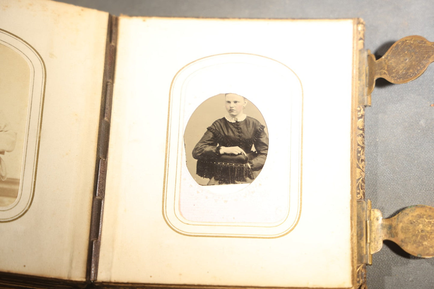 Antique Portrait Photo Album Containing 32 Tintype Photographs and 11 Carte de Visite C.D.V. Photographs, Leather Binding with Gauffered Edges, manufactured by Altemus & Co., Philadelphia, circa 1860s