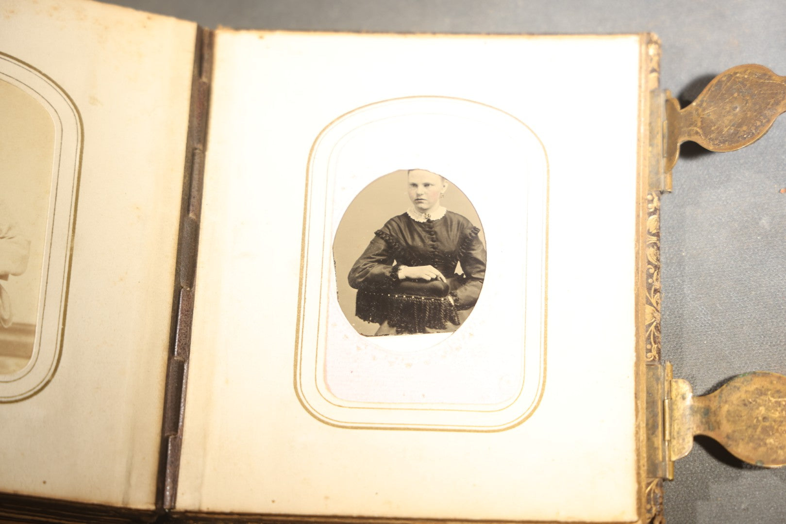Antique Portrait Photo Album Containing 32 Tintype Photographs and 11 Carte de Visite C.D.V. Photographs, Leather Binding with Gauffered Edges, manufactured by Altemus & Co., Philadelphia, circa 1860s