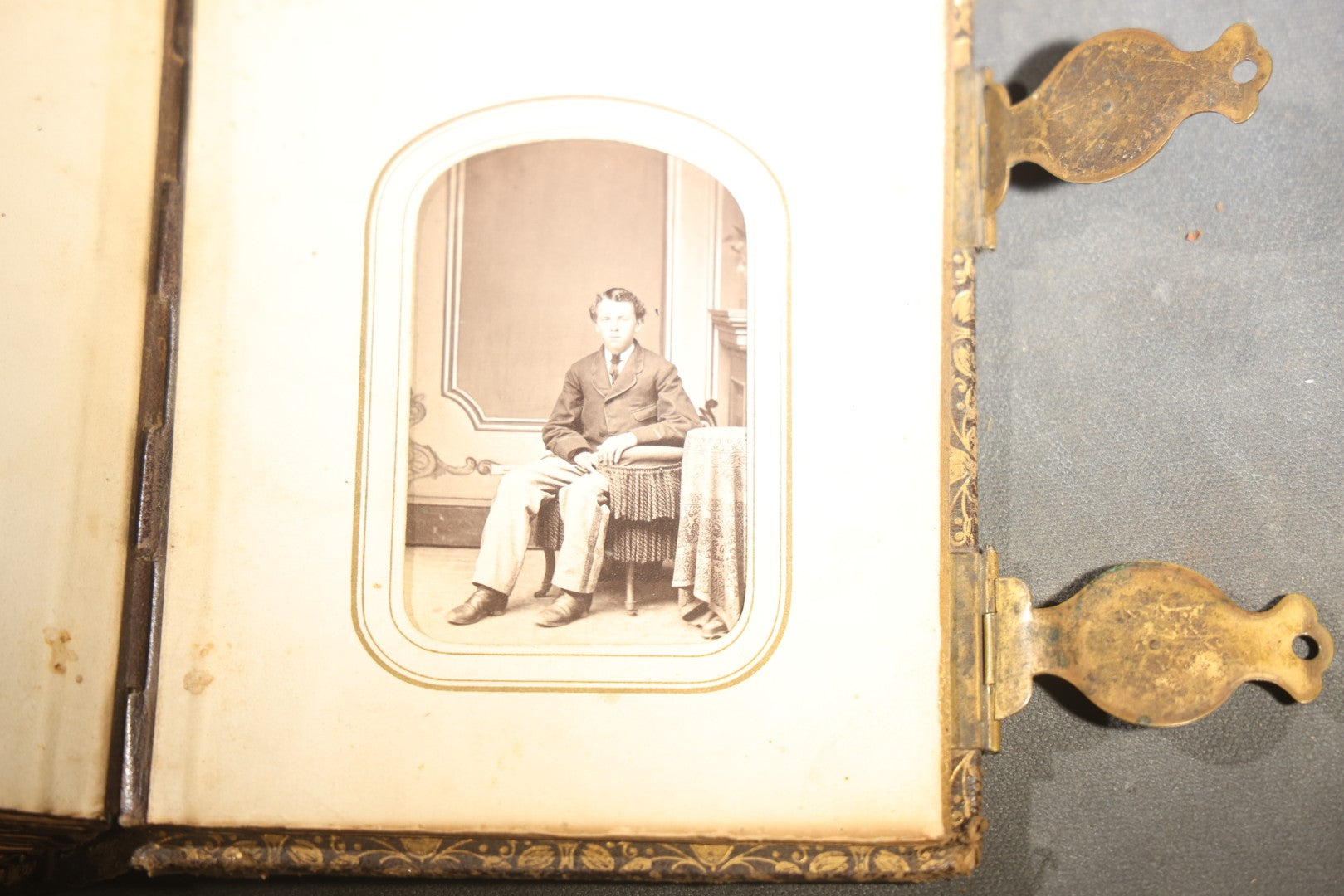 Antique Portrait Photo Album Containing 32 Tintype Photographs and 11 Carte de Visite C.D.V. Photographs, Leather Binding with Gauffered Edges, manufactured by Altemus & Co., Philadelphia, circa 1860s