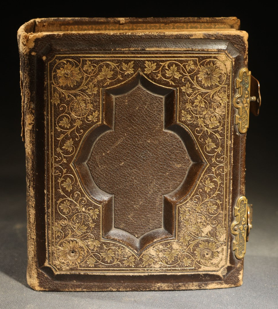 Antique Portrait Photo Album Containing 15 Tintype Photographs and 29 C.D.V. Photographs, Including Hand-Tinted Tintype Examples, note binding in poor condition