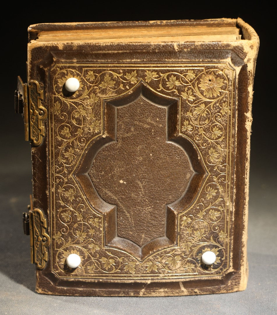 Antique Portrait Photo Album Containing 15 Tintype Photographs and 29 C.D.V. Photographs, Including Hand-Tinted Tintype Examples, note binding in poor condition