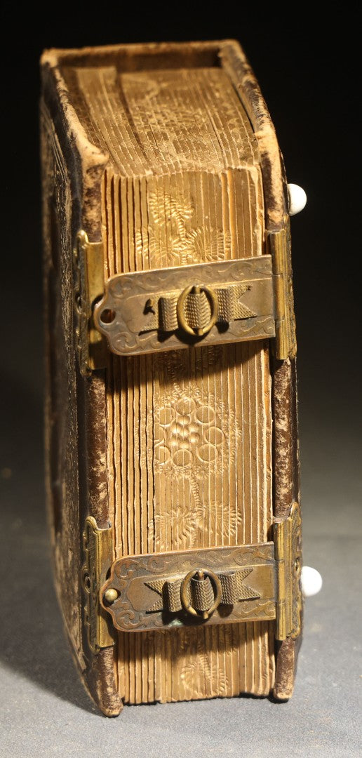 Antique Portrait Photo Album Containing 15 Tintype Photographs and 29 C.D.V. Photographs, Including Hand-Tinted Tintype Examples, note binding in poor condition