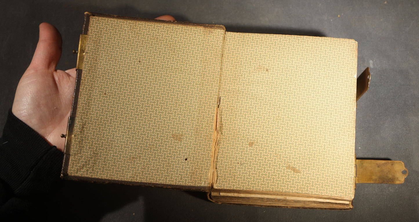 Antique Portrait Photo Album Containing 15 Tintype Photographs and 29 C.D.V. Photographs, Including Hand-Tinted Tintype Examples, note binding in poor condition