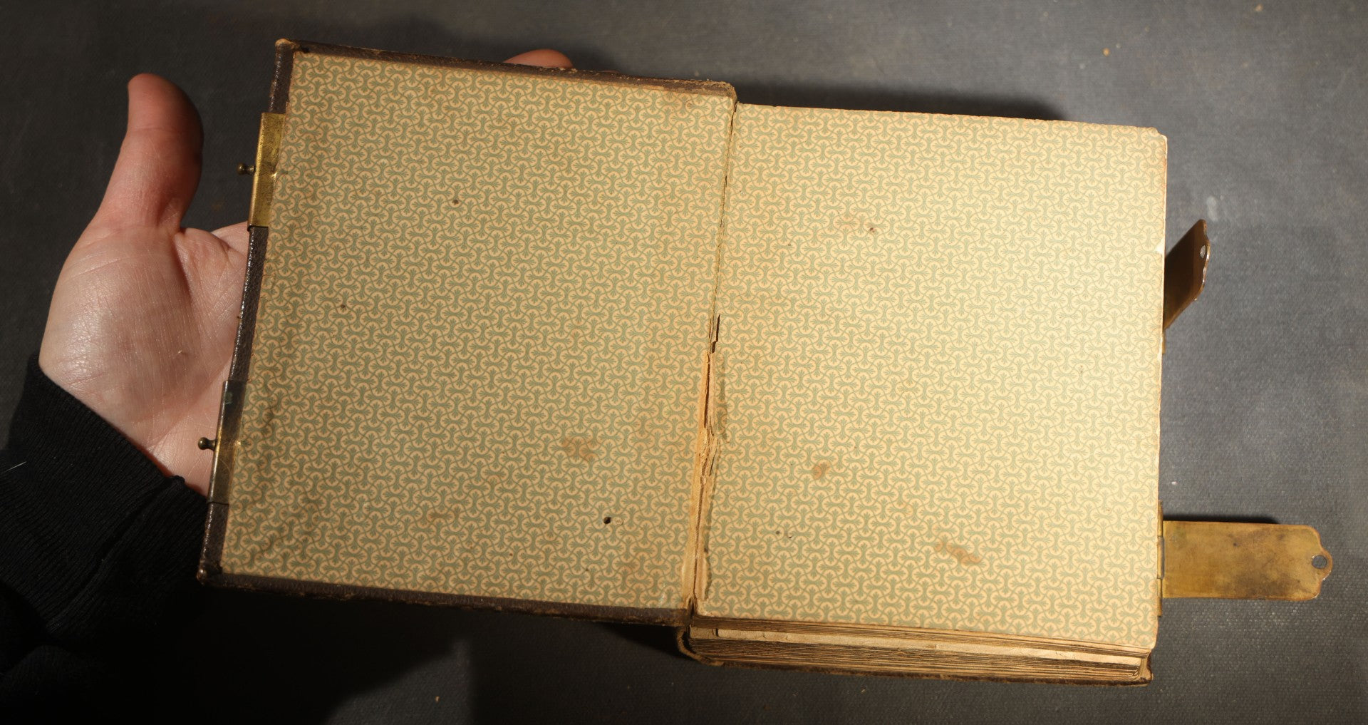 Antique Portrait Photo Album Containing 15 Tintype Photographs and 29 C.D.V. Photographs, Including Hand-Tinted Tintype Examples, note binding in poor condition