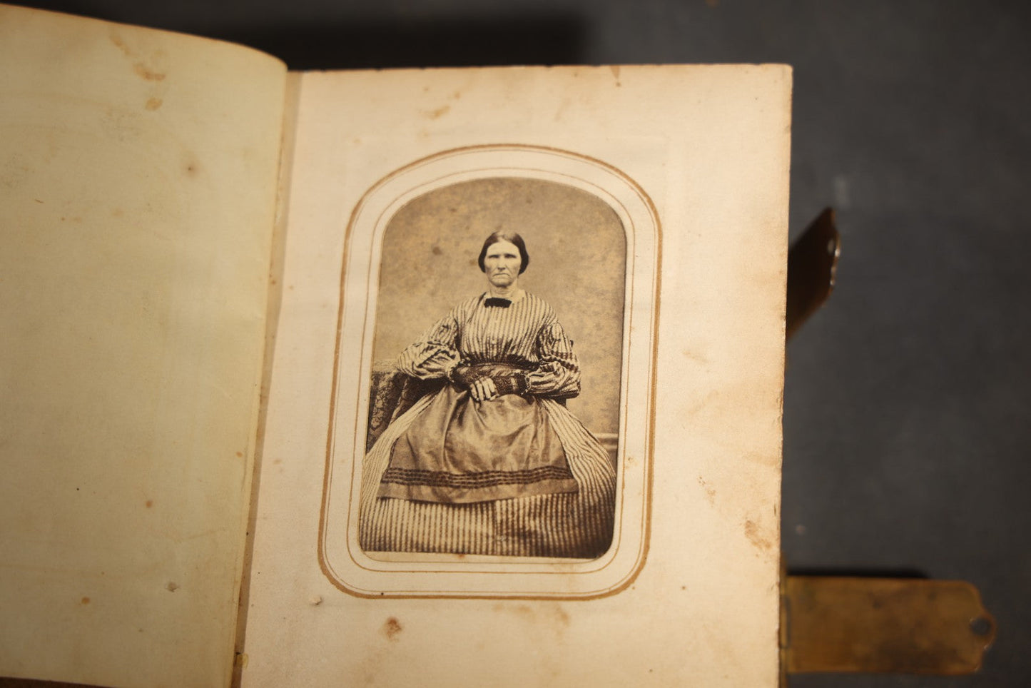 Antique Portrait Photo Album Containing 15 Tintype Photographs and 29 C.D.V. Photographs, Including Hand-Tinted Tintype Examples, note binding in poor condition
