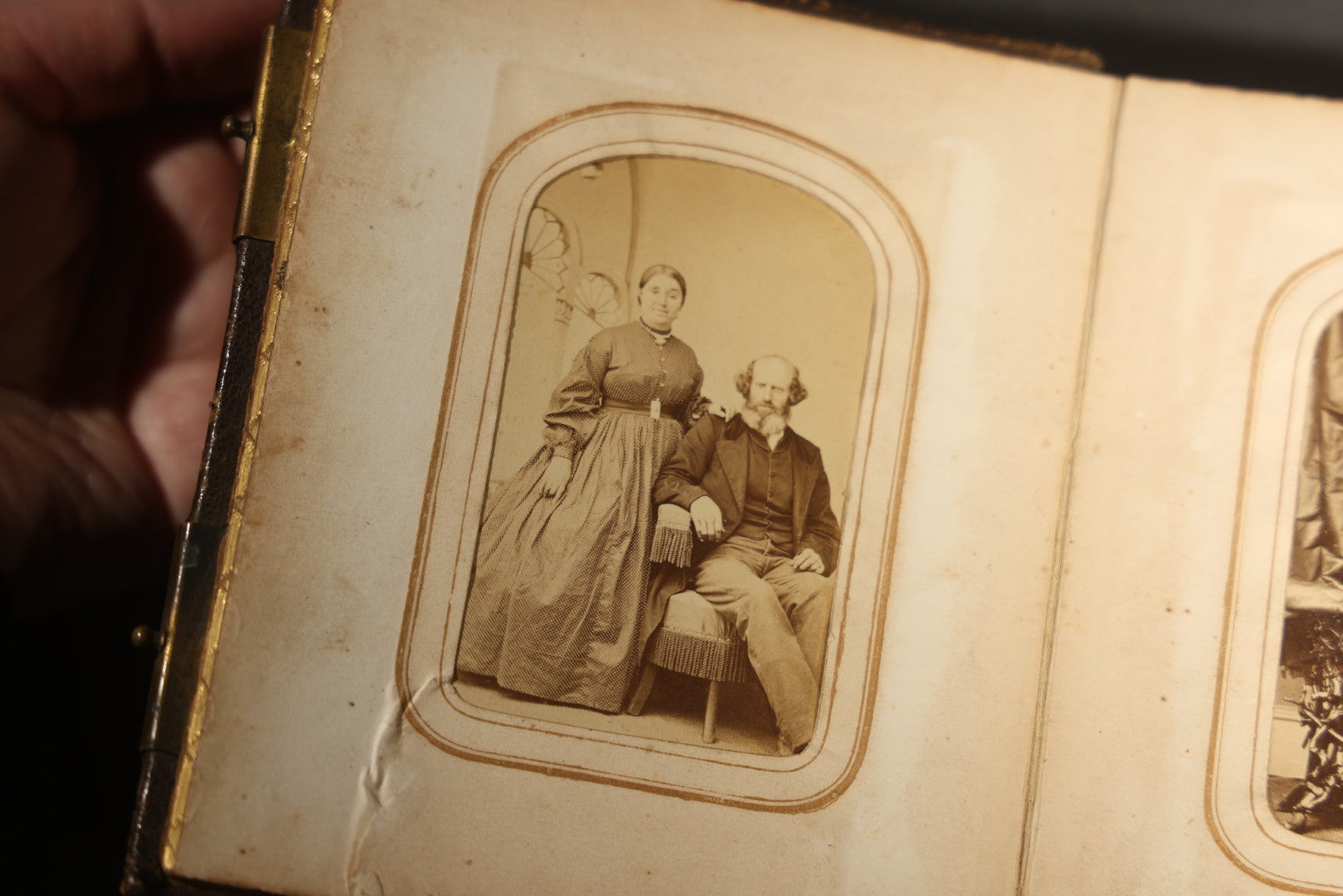 Antique Portrait Photo Album Containing 15 Tintype Photographs and 29 C.D.V. Photographs, Including Hand-Tinted Tintype Examples, note binding in poor condition