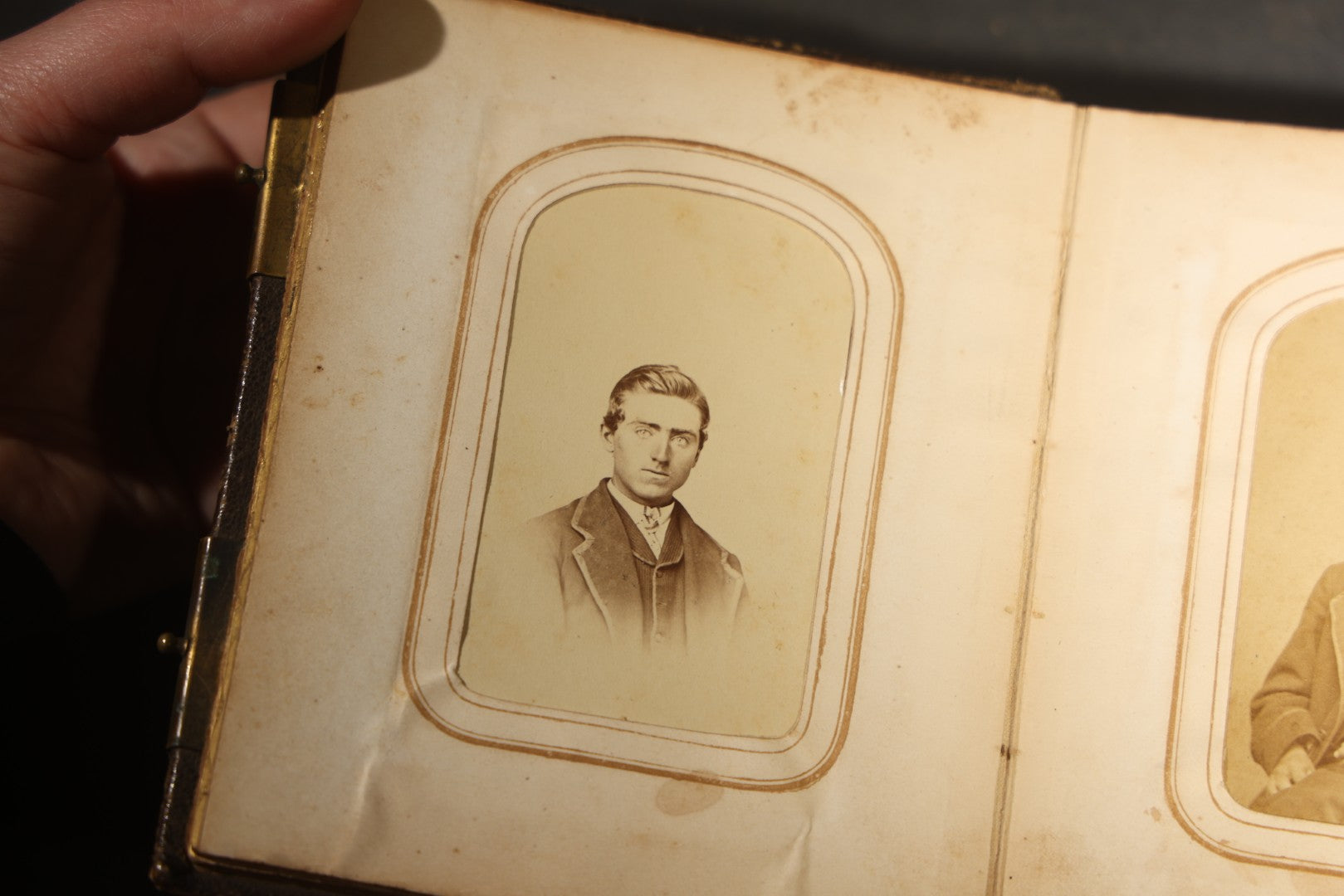 Antique Portrait Photo Album Containing 15 Tintype Photographs and 29 C.D.V. Photographs, Including Hand-Tinted Tintype Examples, note binding in poor condition