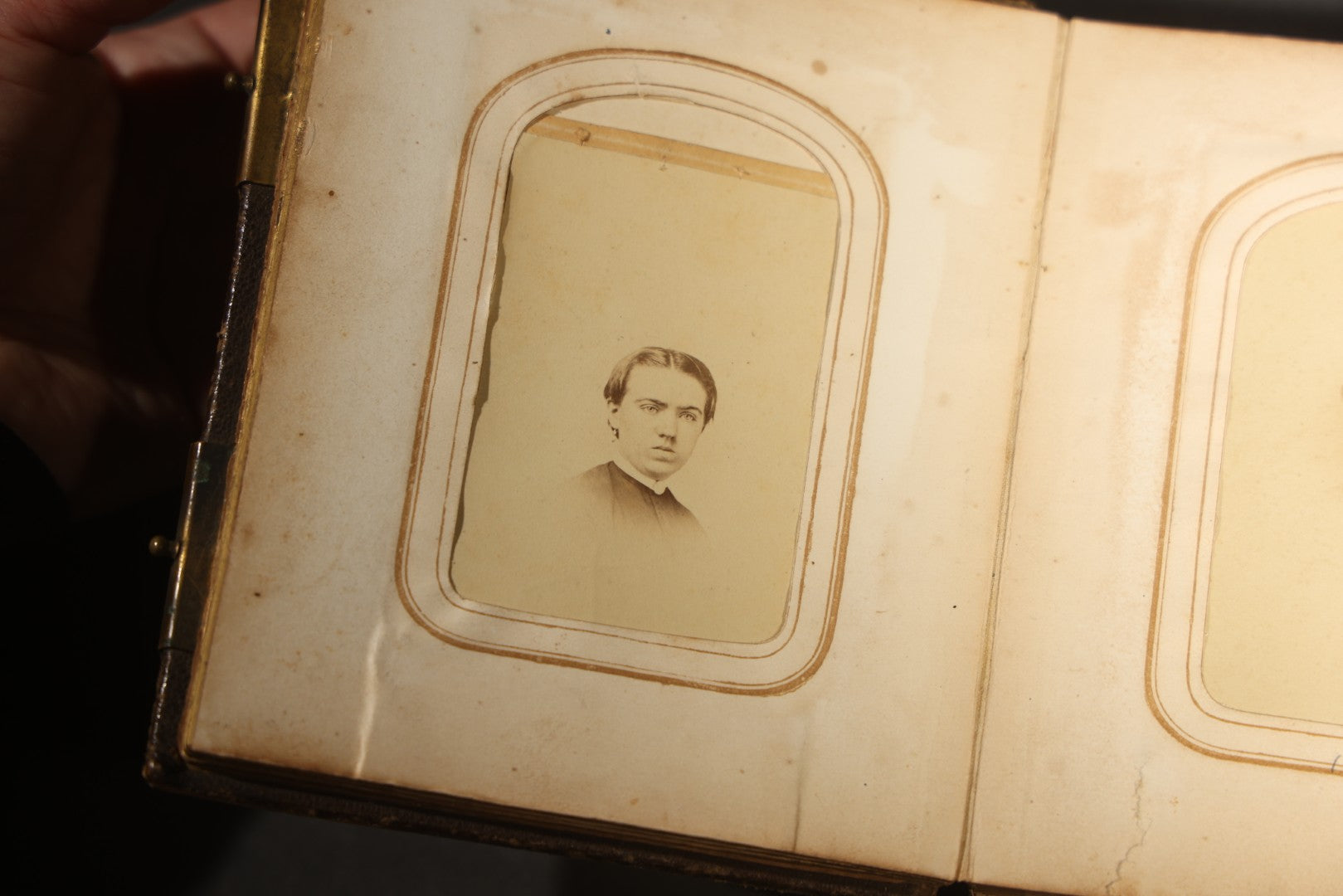 Antique Portrait Photo Album Containing 15 Tintype Photographs and 29 C.D.V. Photographs, Including Hand-Tinted Tintype Examples, note binding in poor condition