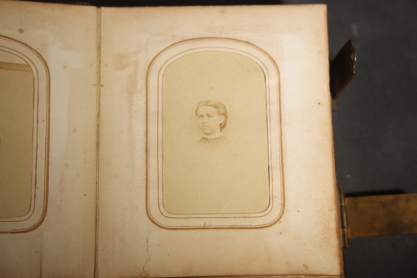 Antique Portrait Photo Album Containing 15 Tintype Photographs and 29 C.D.V. Photographs, Including Hand-Tinted Tintype Examples, note binding in poor condition