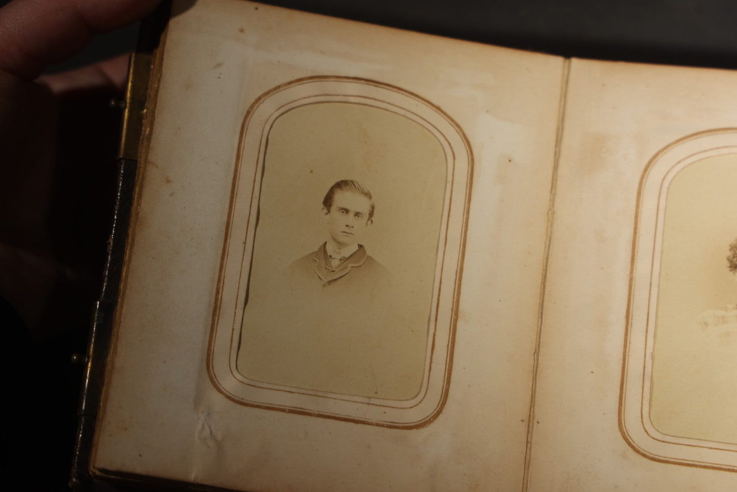 Antique Portrait Photo Album Containing 15 Tintype Photographs and 29 C.D.V. Photographs, Including Hand-Tinted Tintype Examples, note binding in poor condition