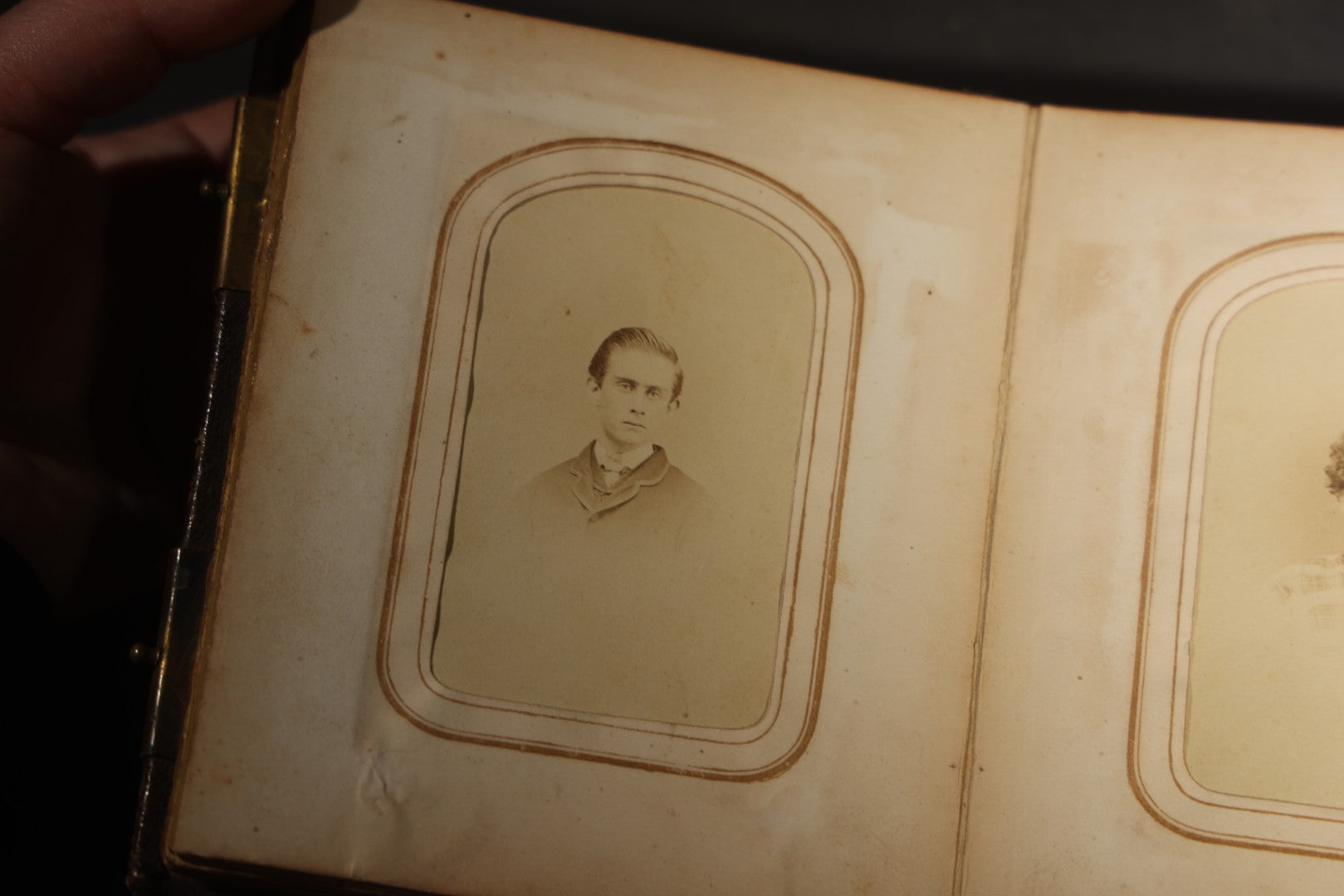 Antique Portrait Photo Album Containing 15 Tintype Photographs and 29 C.D.V. Photographs, Including Hand-Tinted Tintype Examples, note binding in poor condition