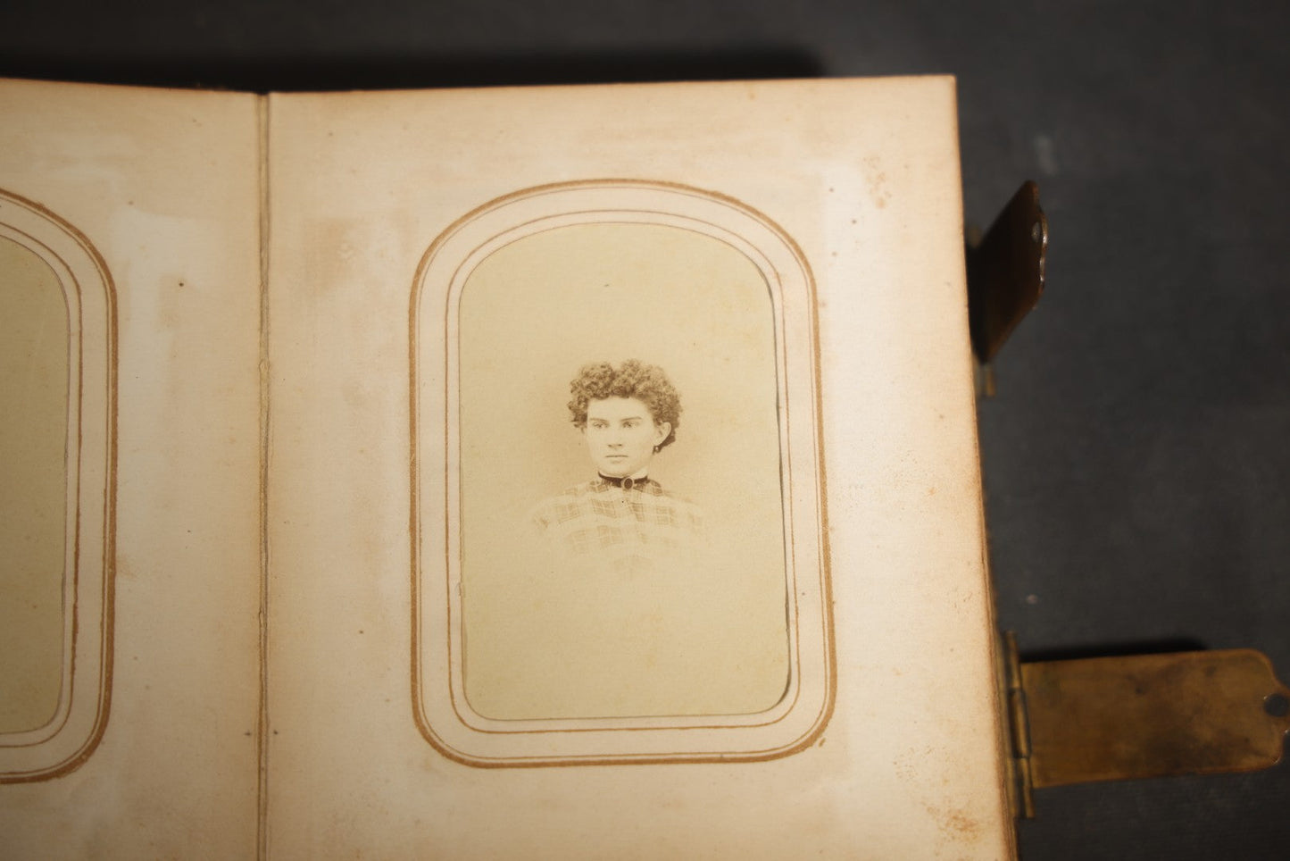 Antique Portrait Photo Album Containing 15 Tintype Photographs and 29 C.D.V. Photographs, Including Hand-Tinted Tintype Examples, note binding in poor condition