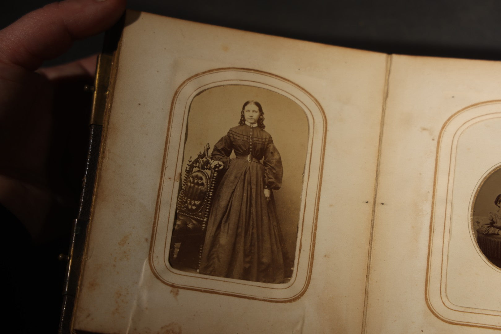 Antique Portrait Photo Album Containing 15 Tintype Photographs and 29 C.D.V. Photographs, Including Hand-Tinted Tintype Examples, note binding in poor condition