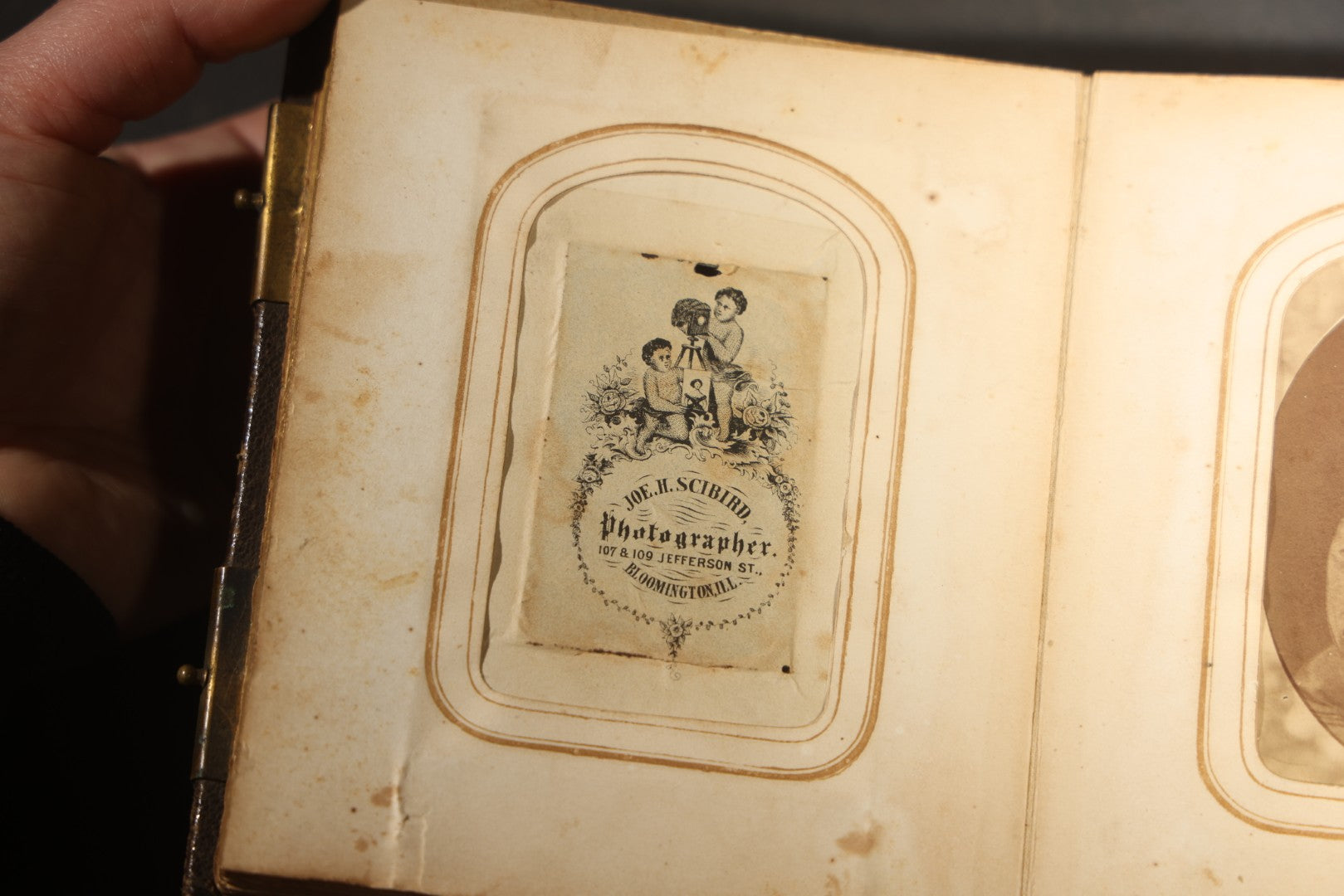 Antique Portrait Photo Album Containing 15 Tintype Photographs and 29 C.D.V. Photographs, Including Hand-Tinted Tintype Examples, note binding in poor condition