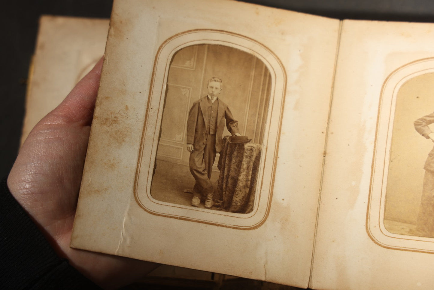 Antique Portrait Photo Album Containing 15 Tintype Photographs and 29 C.D.V. Photographs, Including Hand-Tinted Tintype Examples, note binding in poor condition