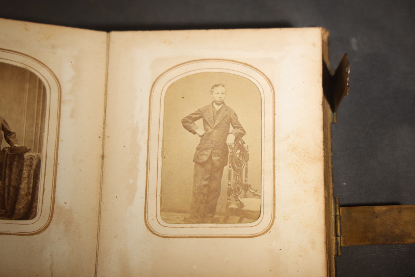 Antique Portrait Photo Album Containing 15 Tintype Photographs and 29 C.D.V. Photographs, Including Hand-Tinted Tintype Examples, note binding in poor condition