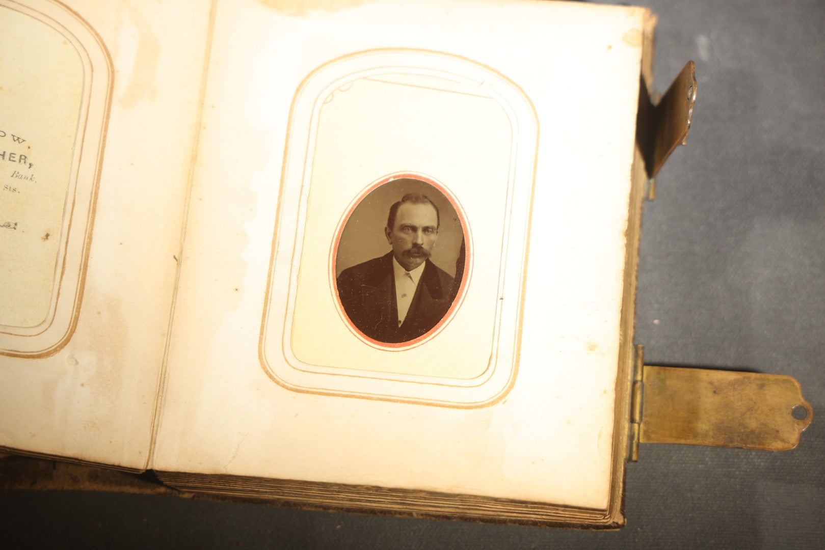 Antique Portrait Photo Album Containing 15 Tintype Photographs and 29 C.D.V. Photographs, Including Hand-Tinted Tintype Examples, note binding in poor condition