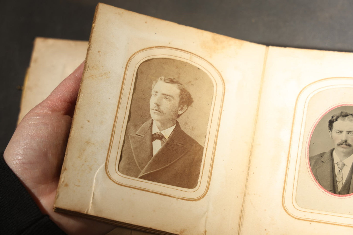 Antique Portrait Photo Album Containing 15 Tintype Photographs and 29 C.D.V. Photographs, Including Hand-Tinted Tintype Examples, note binding in poor condition