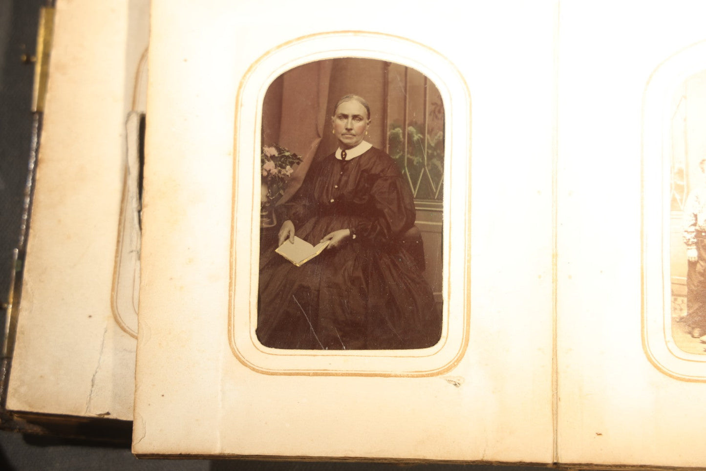 Antique Portrait Photo Album Containing 15 Tintype Photographs and 29 C.D.V. Photographs, Including Hand-Tinted Tintype Examples, note binding in poor condition