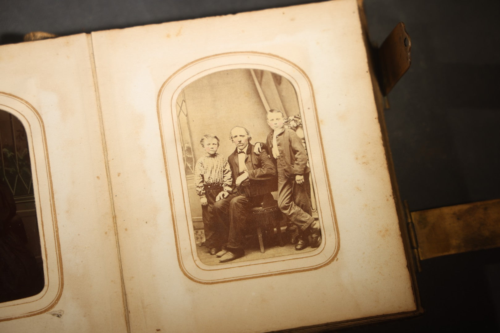 Antique Portrait Photo Album Containing 15 Tintype Photographs and 29 C.D.V. Photographs, Including Hand-Tinted Tintype Examples, note binding in poor condition