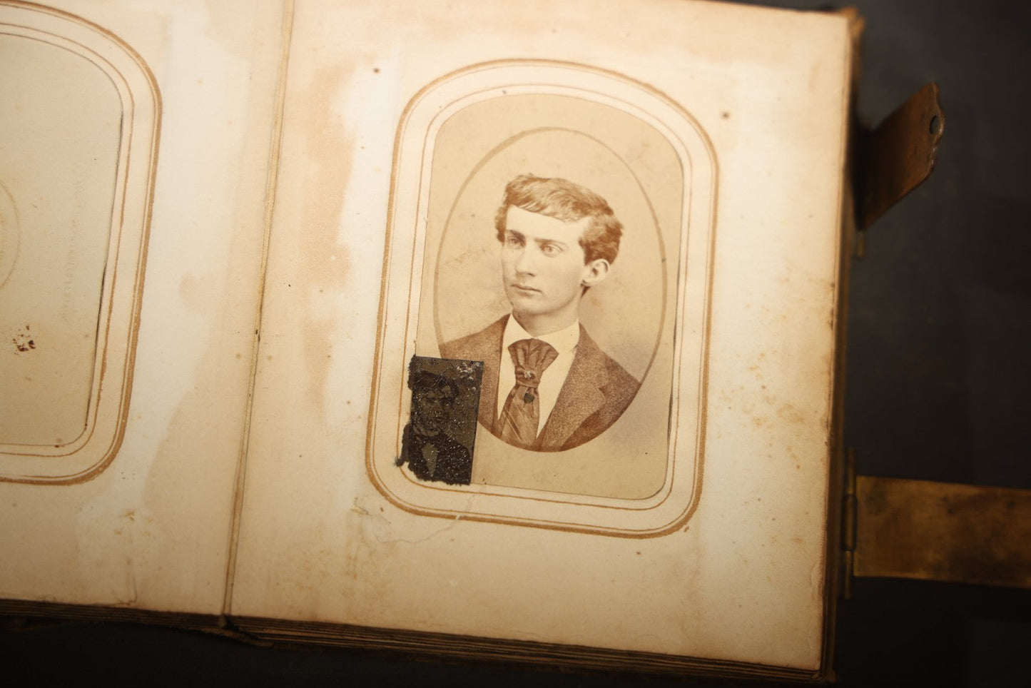 Antique Portrait Photo Album Containing 15 Tintype Photographs and 29 C.D.V. Photographs, Including Hand-Tinted Tintype Examples, note binding in poor condition