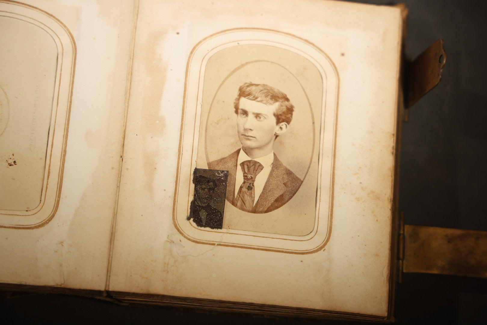Antique Portrait Photo Album Containing 15 Tintype Photographs and 29 C.D.V. Photographs, Including Hand-Tinted Tintype Examples, note binding in poor condition