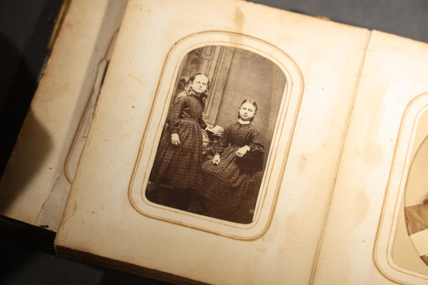 Antique Portrait Photo Album Containing 15 Tintype Photographs and 29 C.D.V. Photographs, Including Hand-Tinted Tintype Examples, note binding in poor condition