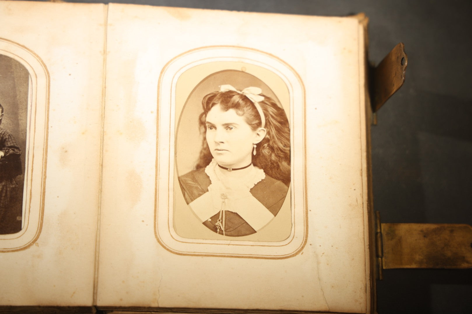 Antique Portrait Photo Album Containing 15 Tintype Photographs and 29 C.D.V. Photographs, Including Hand-Tinted Tintype Examples, note binding in poor condition