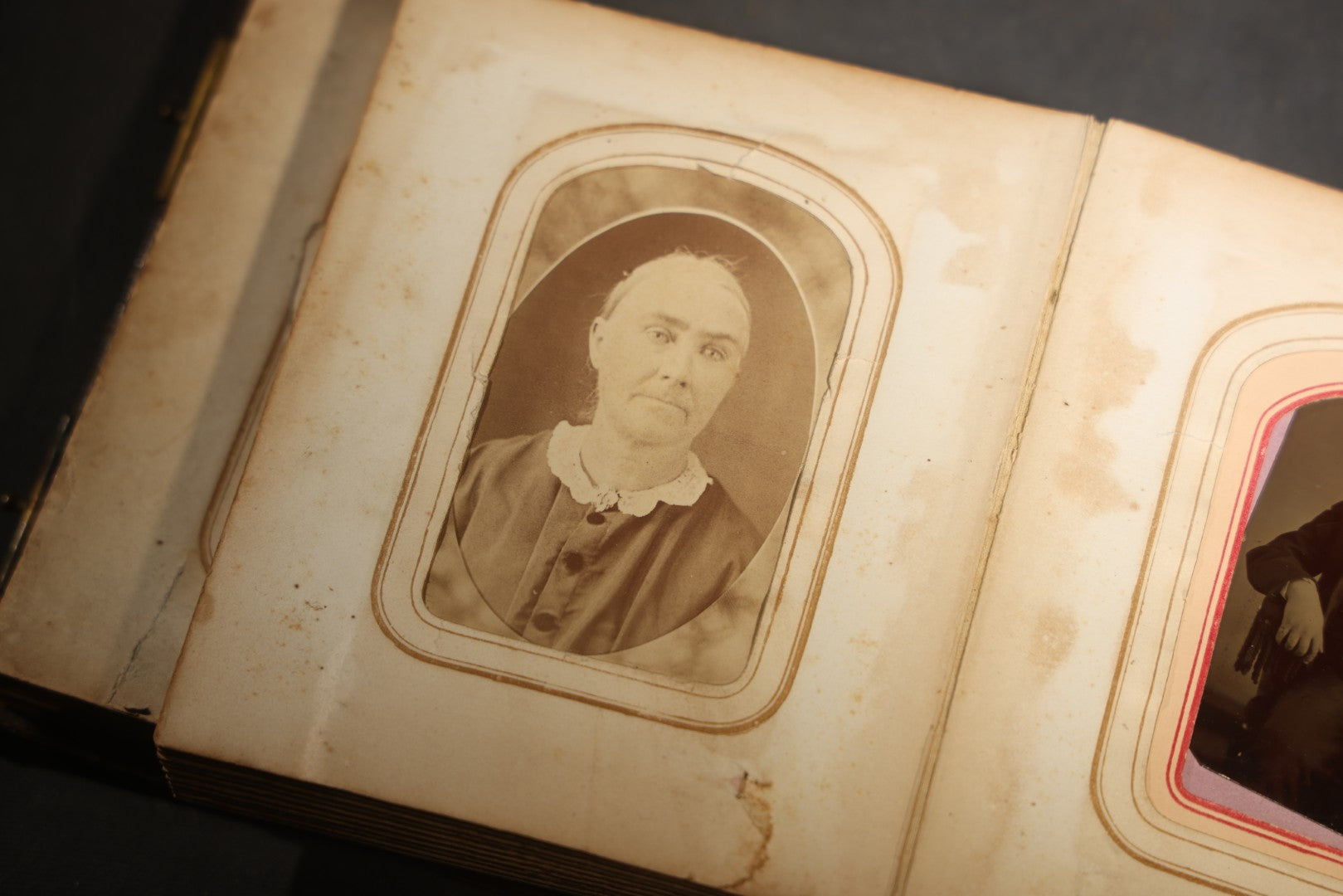 Antique Portrait Photo Album Containing 15 Tintype Photographs and 29 C.D.V. Photographs, Including Hand-Tinted Tintype Examples, note binding in poor condition