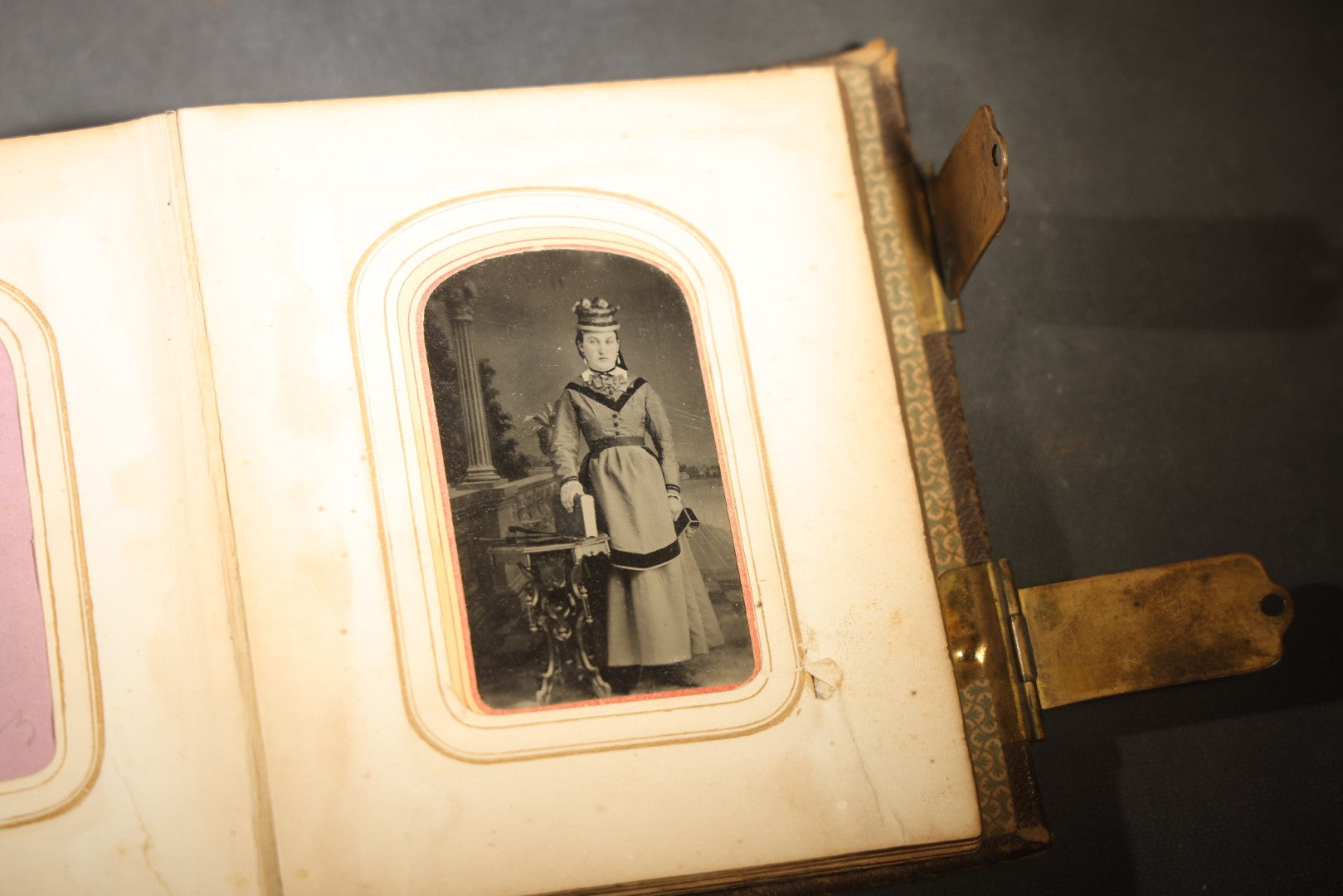 Antique Portrait Photo Album Containing 15 Tintype Photographs and 29 C.D.V. Photographs, Including Hand-Tinted Tintype Examples, note binding in poor condition