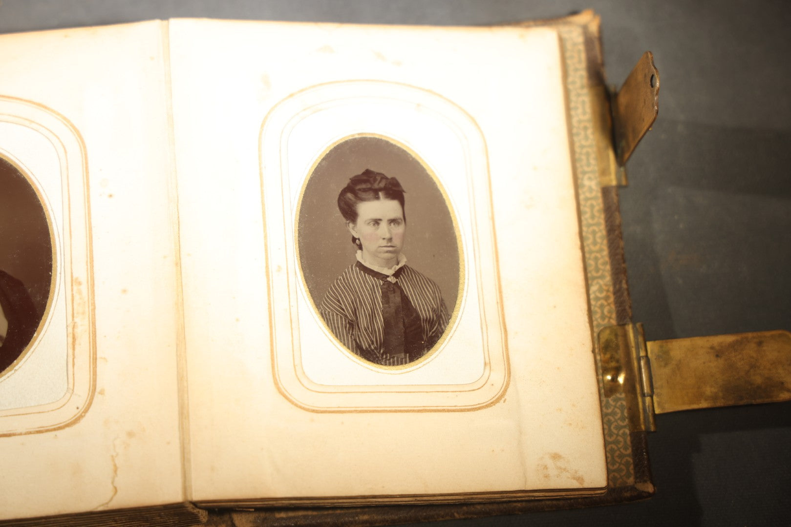 Antique Portrait Photo Album Containing 15 Tintype Photographs and 29 C.D.V. Photographs, Including Hand-Tinted Tintype Examples, note binding in poor condition