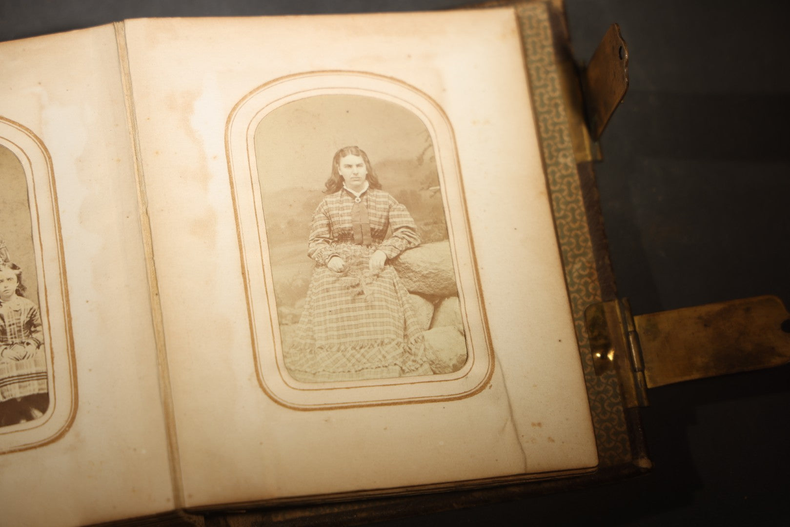 Antique Portrait Photo Album Containing 15 Tintype Photographs and 29 C.D.V. Photographs, Including Hand-Tinted Tintype Examples, note binding in poor condition