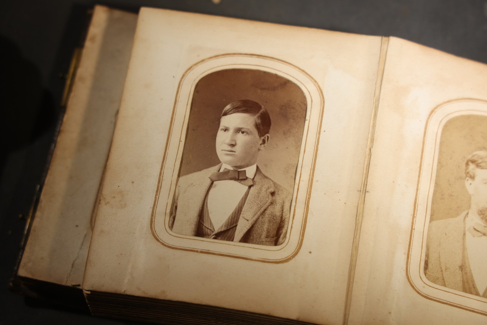 Antique Portrait Photo Album Containing 15 Tintype Photographs and 29 C.D.V. Photographs, Including Hand-Tinted Tintype Examples, note binding in poor condition