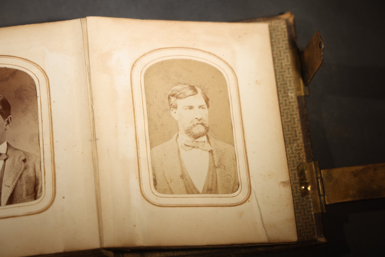 Antique Portrait Photo Album Containing 15 Tintype Photographs and 29 C.D.V. Photographs, Including Hand-Tinted Tintype Examples, note binding in poor condition