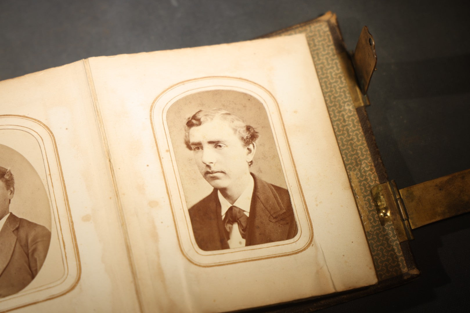 Antique Portrait Photo Album Containing 15 Tintype Photographs and 29 C.D.V. Photographs, Including Hand-Tinted Tintype Examples, note binding in poor condition