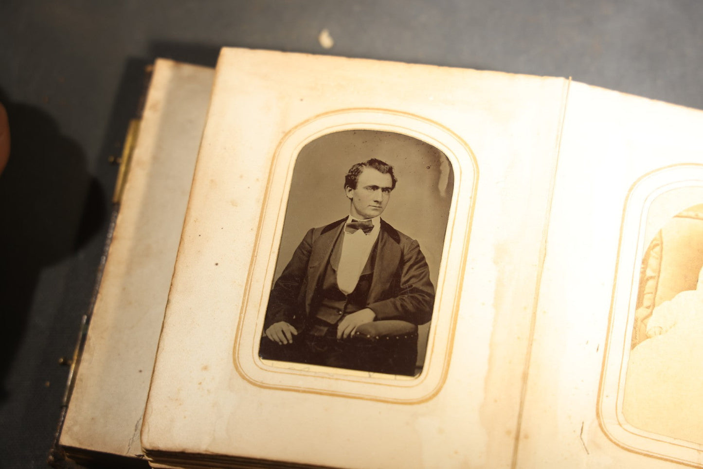 Antique Portrait Photo Album Containing 15 Tintype Photographs and 29 C.D.V. Photographs, Including Hand-Tinted Tintype Examples, note binding in poor condition