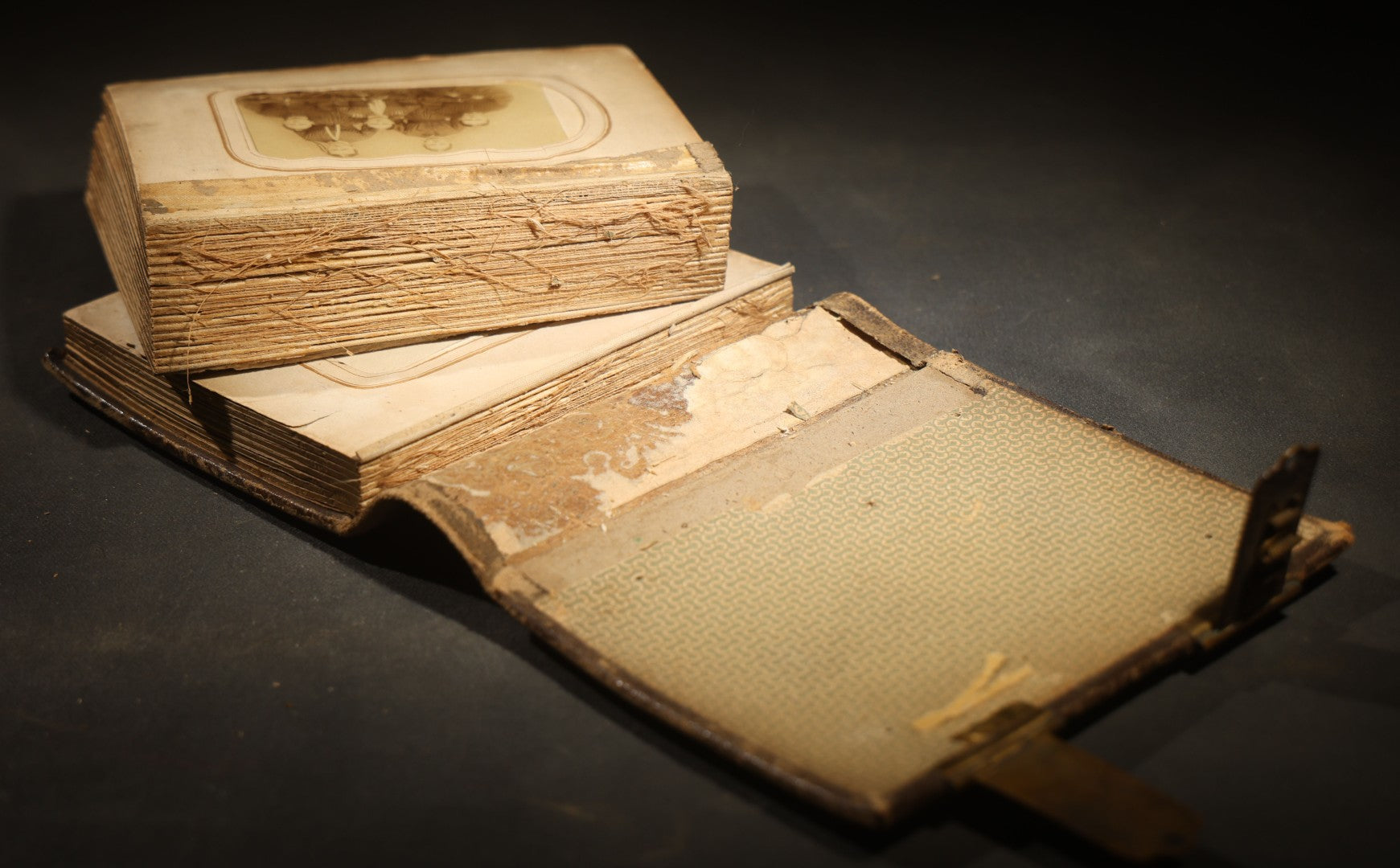 Antique Portrait Photo Album Containing 15 Tintype Photographs and 29 C.D.V. Photographs, Including Hand-Tinted Tintype Examples, note binding in poor condition