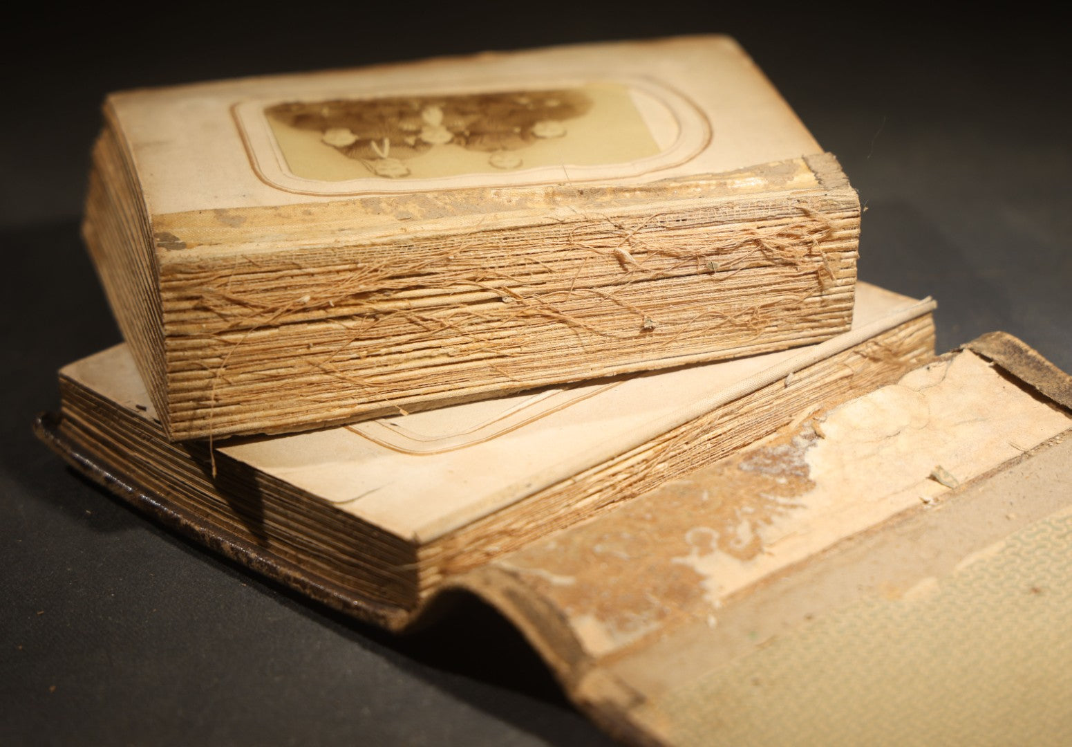 Antique Portrait Photo Album Containing 15 Tintype Photographs and 29 C.D.V. Photographs, Including Hand-Tinted Tintype Examples, note binding in poor condition