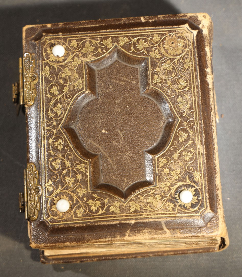 Antique Portrait Photo Album Containing 15 Tintype Photographs and 29 C.D.V. Photographs, Including Hand-Tinted Tintype Examples, note binding in poor condition