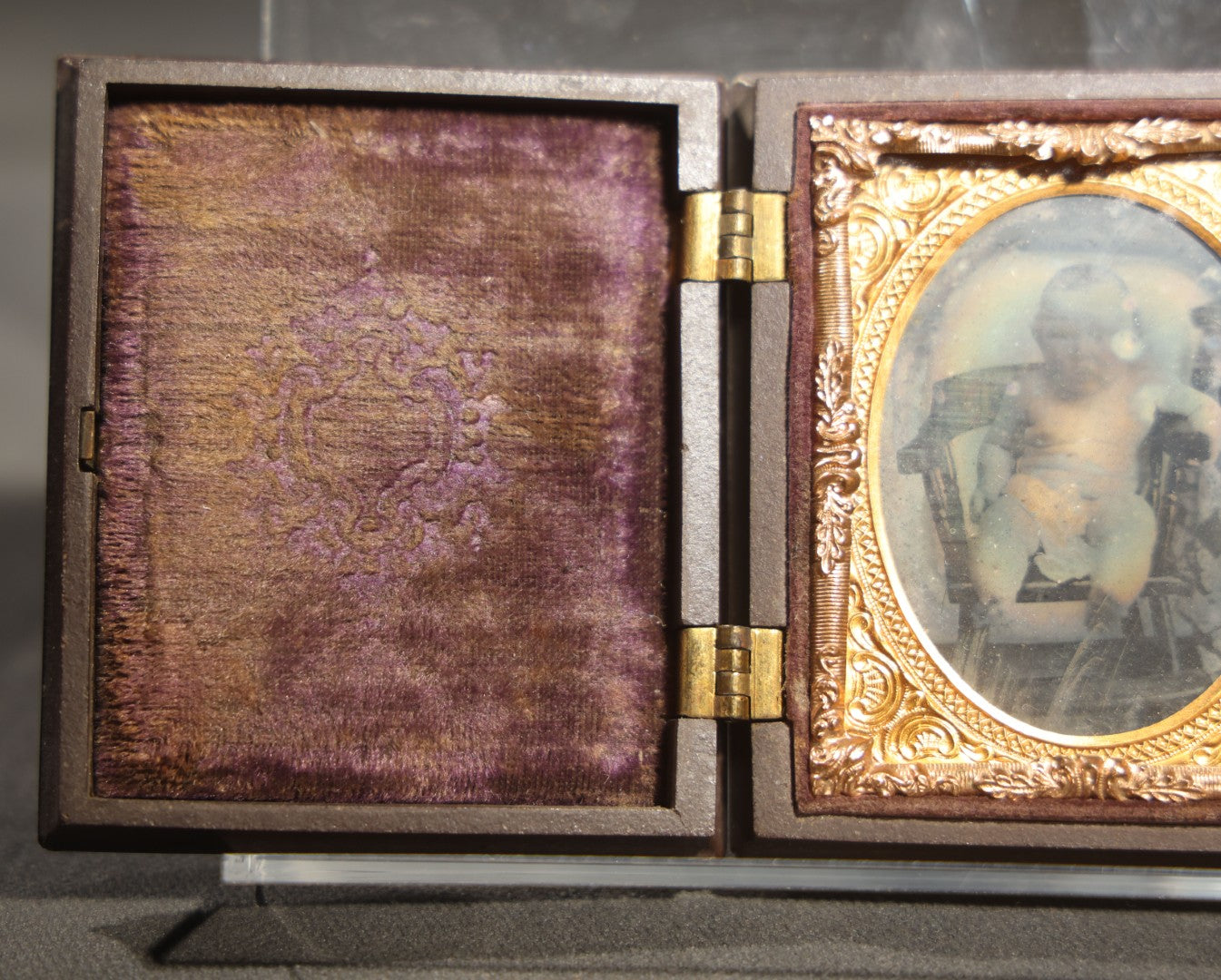 Antique 1/9th Plate Ambrotype Photograph of a Seated Baby in Thermoplastic Union Case with Floral Motif