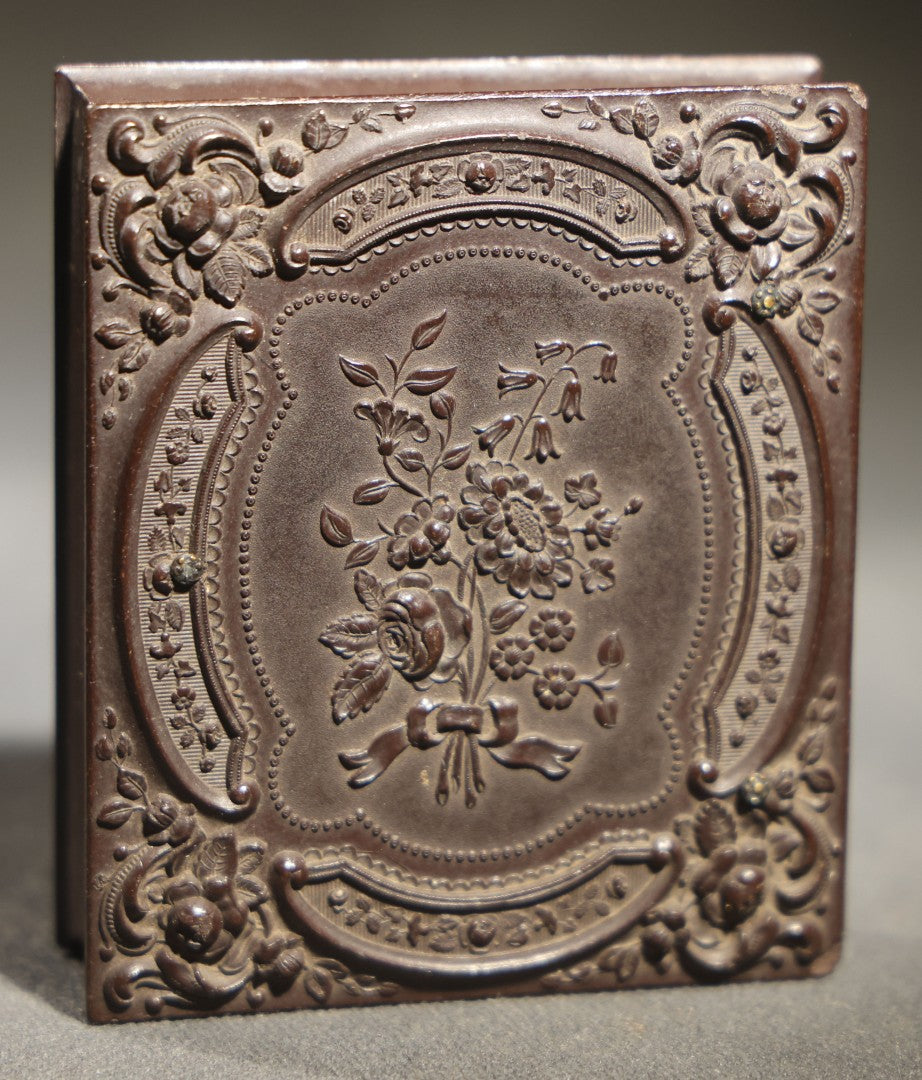 Antique 1/9th Plate Ambrotype Photograph of a Seated Baby in Thermoplastic Union Case with Floral Motif