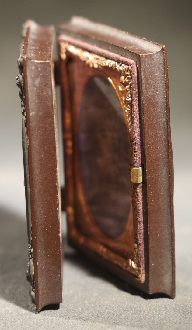 Antique 1/9th Plate Ambrotype Photograph of a Seated Baby in Thermoplastic Union Case with Floral Motif