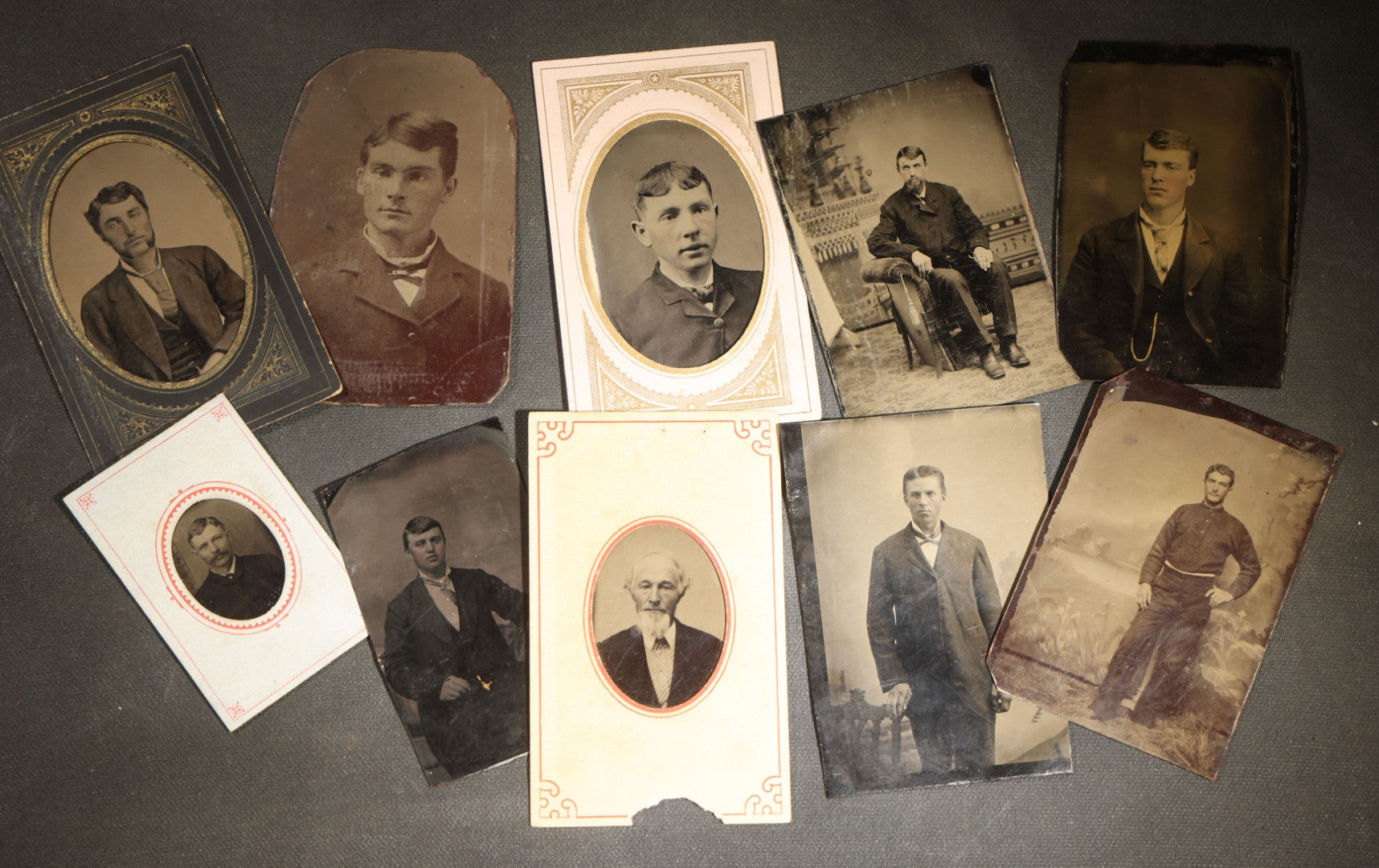 Grouping of 10 Antique Tintype Photographs of Men, Some in Paper Frames and Mats, Including Various Portrait Poses