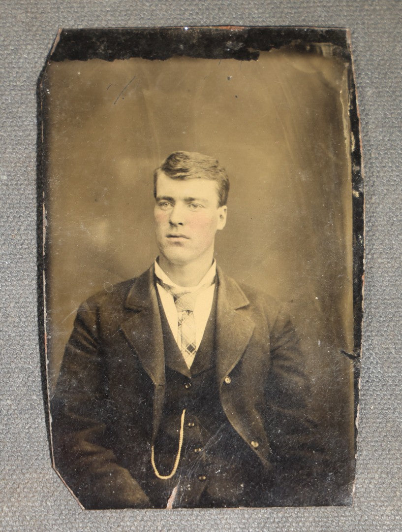 Grouping of 10 Antique Tintype Photographs of Men, Some in Paper Frames and Mats, Including Various Portrait Poses