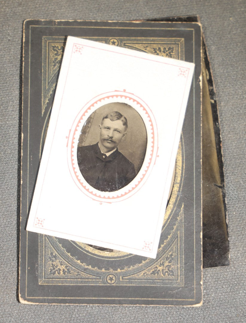 Grouping of 10 Antique Tintype Photographs of Men, Some in Paper Frames and Mats, Including Various Portrait Poses