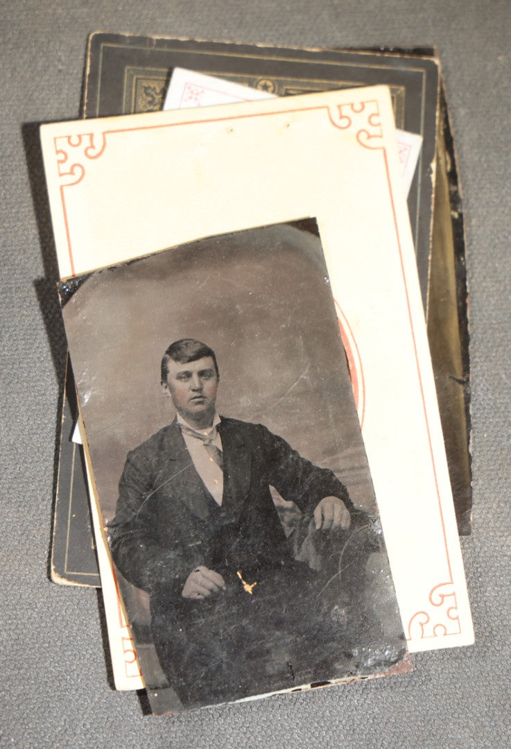 Grouping of 10 Antique Tintype Photographs of Men, Some in Paper Frames and Mats, Including Various Portrait Poses
