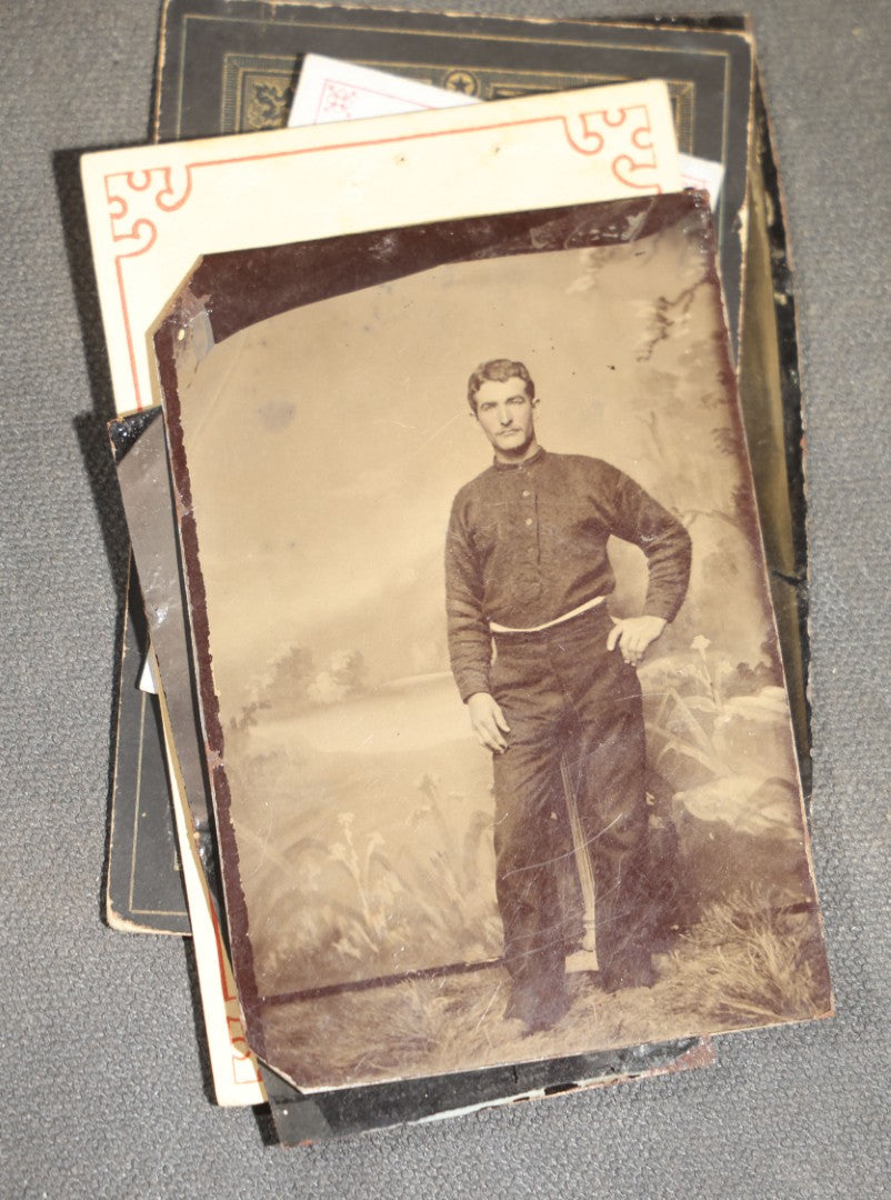 Grouping of 10 Antique Tintype Photographs of Men, Some in Paper Frames and Mats, Including Various Portrait Poses