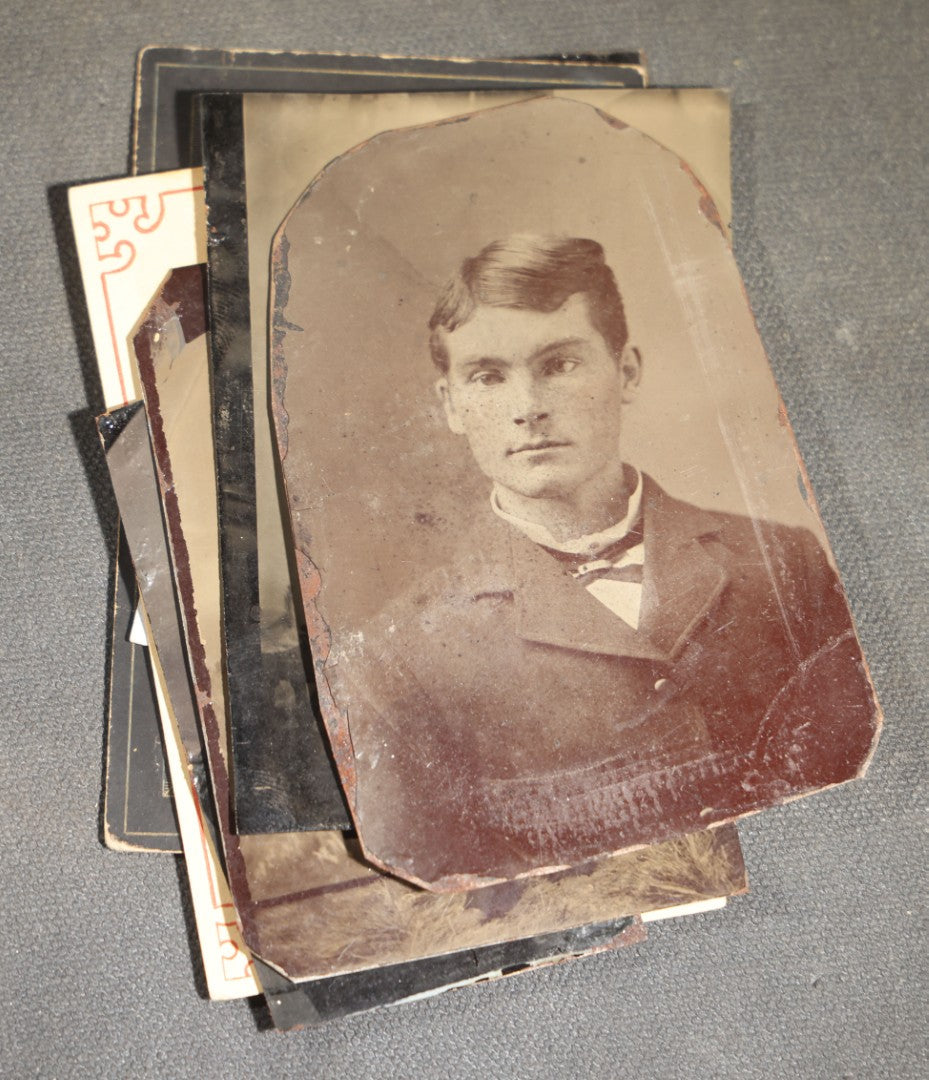 Grouping of 10 Antique Tintype Photographs of Men, Some in Paper Frames and Mats, Including Various Portrait Poses